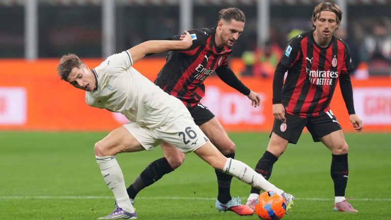 032549200_1764454273-AC_Milan_s_Luka_Modric__right__looks_as_Lazio_s_Toma_Basic__left__and_AC_Milan_s_Adrien_Rabiot