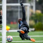 Suporter menyaksikan adu penalti dengan ekspresi tegang